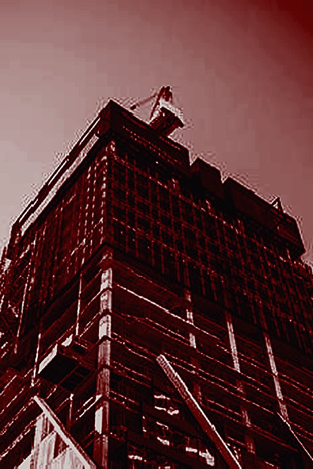 A high-rise office block seen from street level